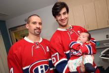 Little Connor with Max Pacioretty and Tomas Plekanec.