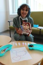 Exam station 2 is coordinated by Child Life Specialist, Nathalie, and is supplied with all kinds of scents to be placed inside teddy bear masks to help them relax before falling asleep for surgery.