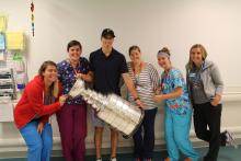 B07 (Sarah's Floor) staff members with Marc-André Fleury and Lord Stanley's Cup. 